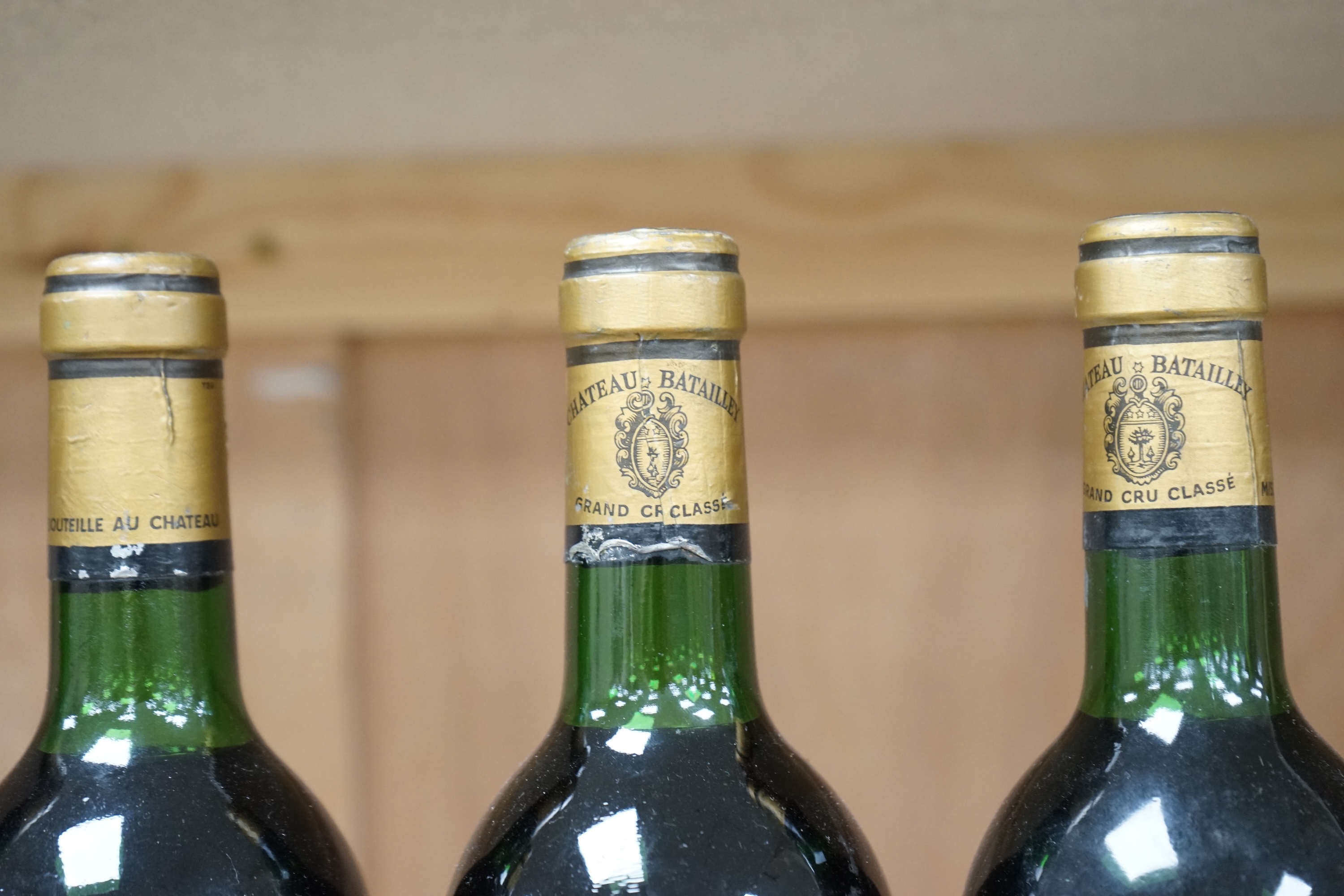 Four bottles of Chateau Batailley, 1982 Grand Cru Classe red wine. Condition - good.